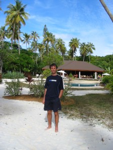 Adriano in front of a small resort on the Isle of Pines Adriano in front of a small resort on the Isle of Pines