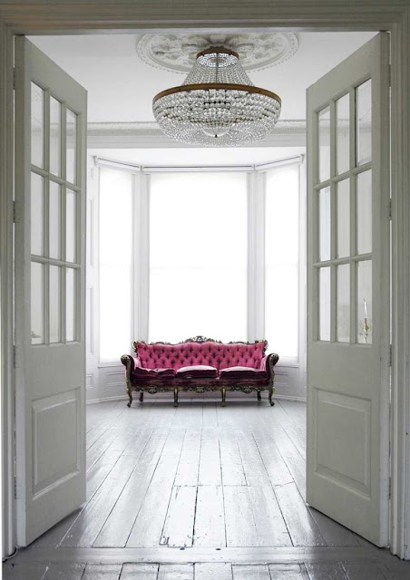 A shot of hot pink in a white room